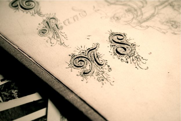 inked-versal-lettering Photograph of some hand-drawn versals
